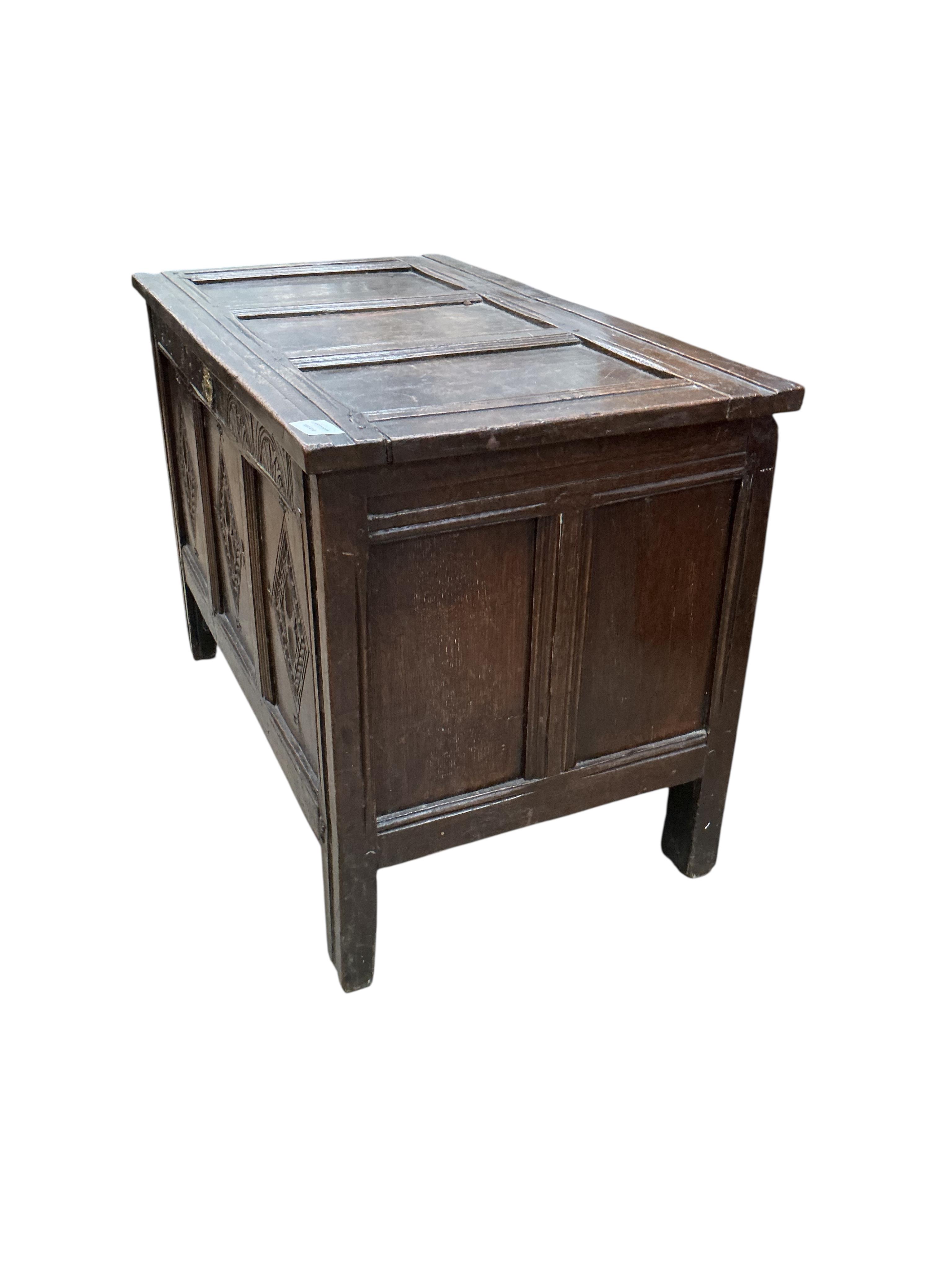 A small 17th century panelled oak coffer, width 87cm, depth 48cm, height 60cm